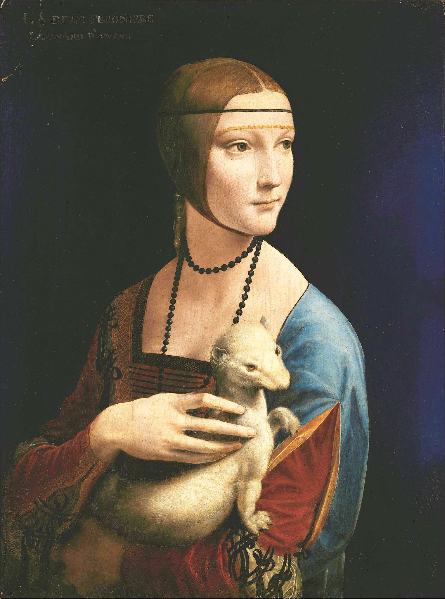 This painting shows a woman holding a small weasel-like animal in her arms. She is wearing a blue dress. Her hair is pulled back into a ponytail and she has a pearl necklace around her neck.The woman is looking to the side with a gentle expression on her face.