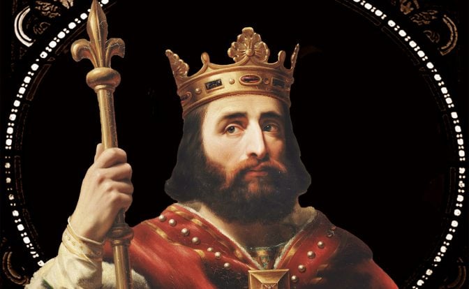 A painting of king Pepin the Short wearing a red robe and a gold crown, holding a gold scepter against a black background with a white circular border.